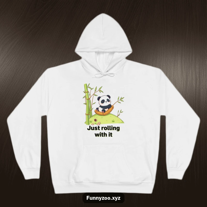 Funny Panda Hoodie: Panda humorously rolling down a slope inside a massive bamboo tube.