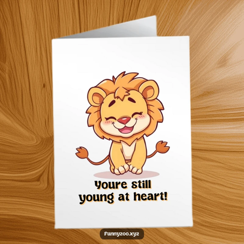 Funny Free Printable Birthday Card: A mischievous lion gleefully chases its tail with a goofy grin.